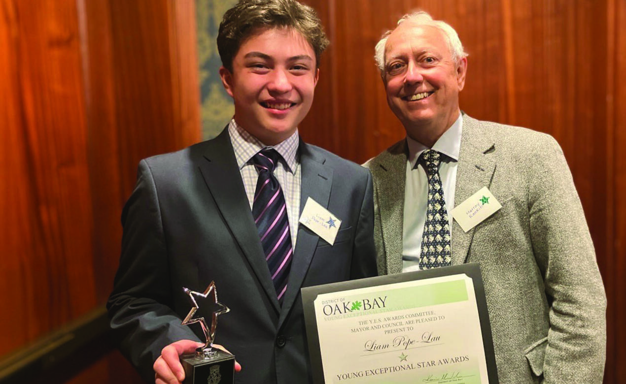 Liam Pope-Lau with MLA Murray Rankin during the YES Awards Ceremony