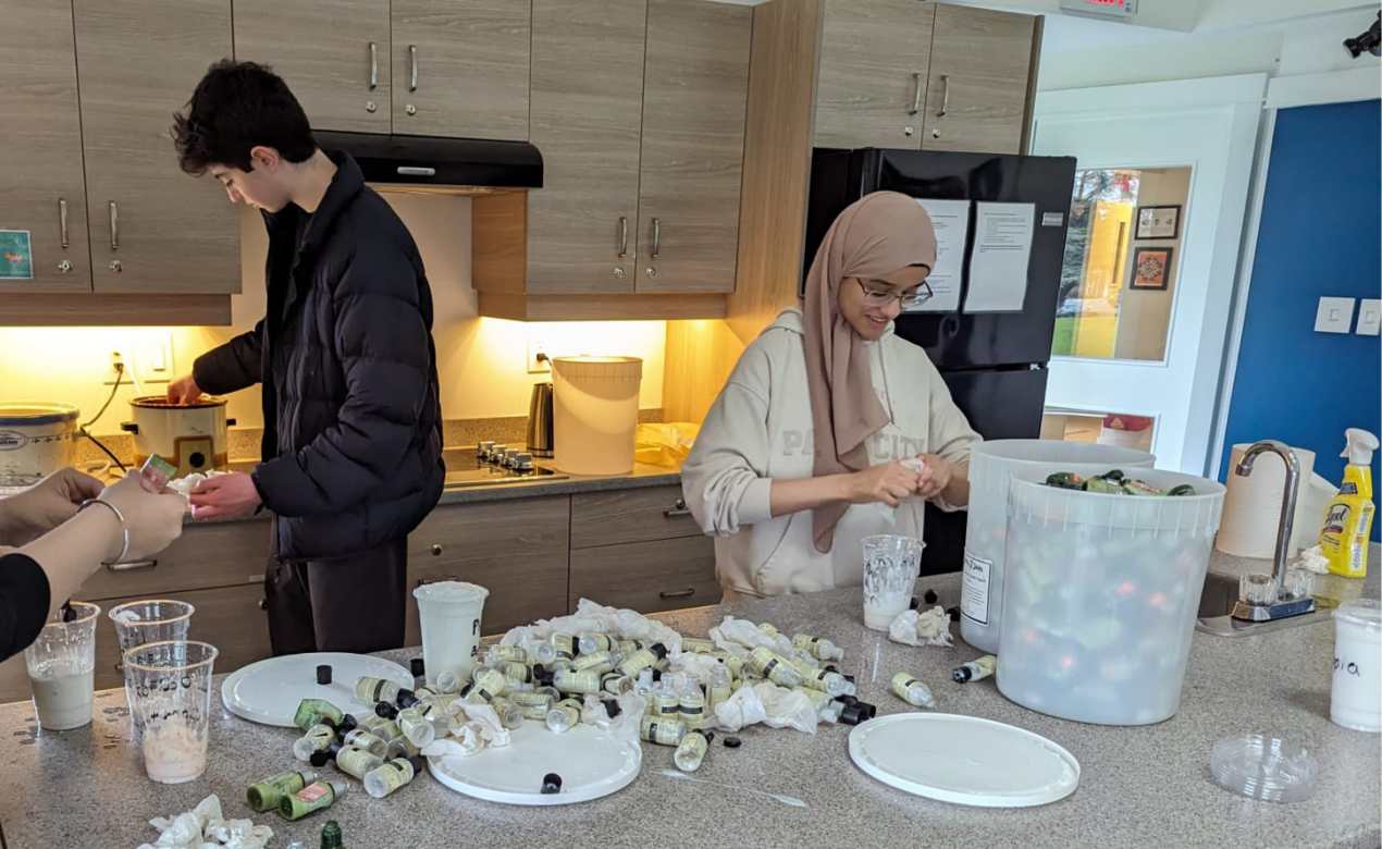 Two boarding students repackaging soap as a service initiative with Soap for Hope