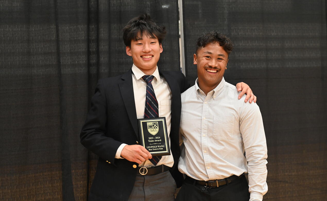 Leupold Wang poses for a photo as the track and field team award winner. 