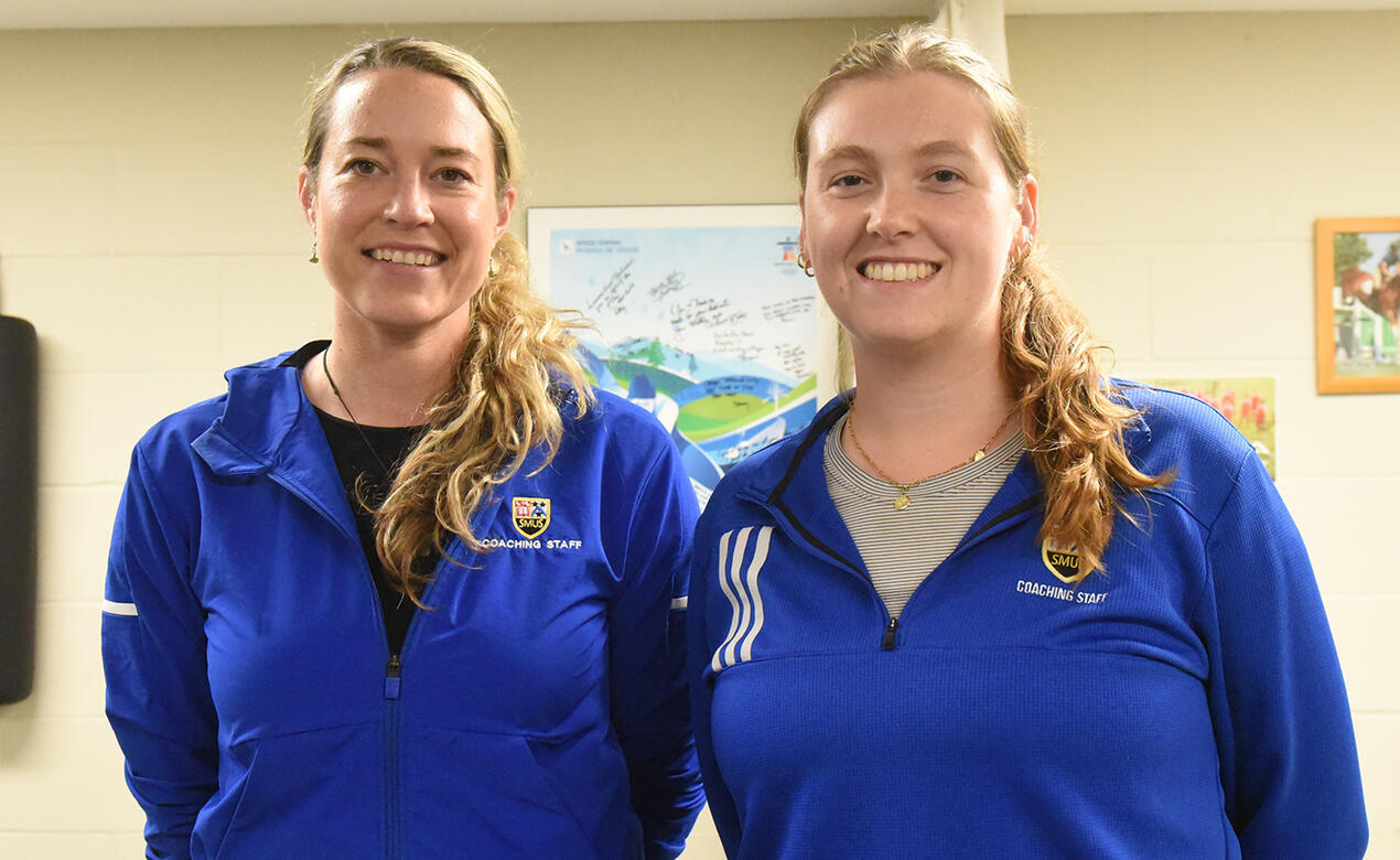 Sydney and Tegan standing in the Athletic Therapy office