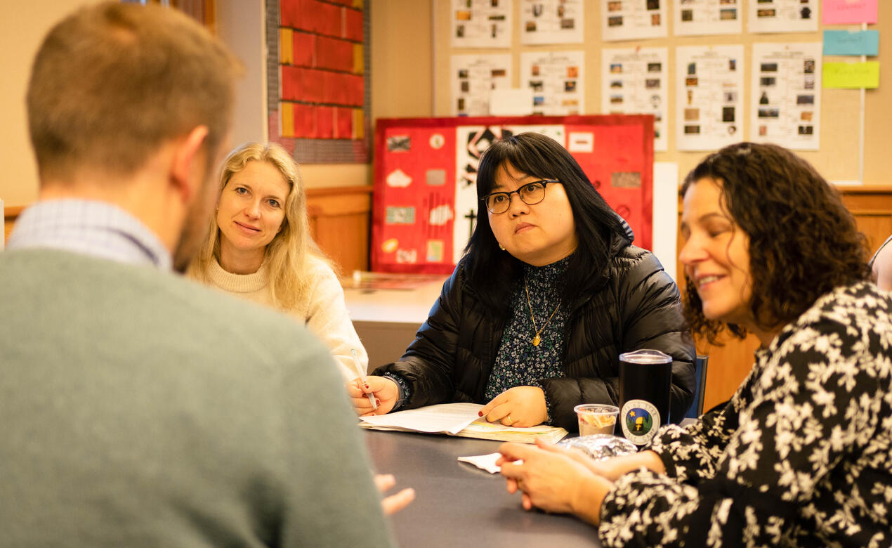 Senior School staff and faculty share in small group discussions.