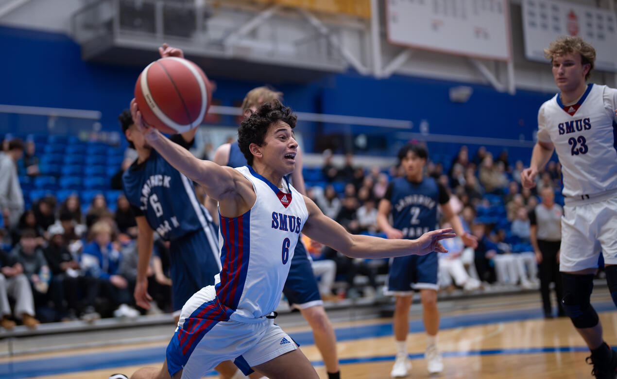 Senior Basketball Action Photo