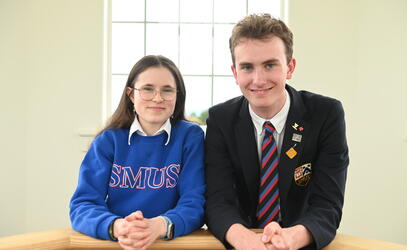2024-25 Head Prefects Chelsea Lee and Will Cuddihy pose together