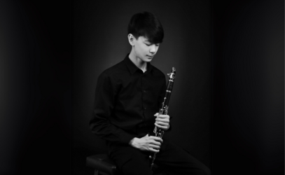 Grade 10 student Matty Angus looks down at his clarinet, in a black and white portrait