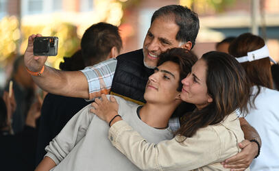 NBO Student with Parents in Quad